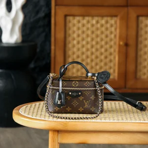 Louis Vuitton Vanity Chain Pouch in monogram coated canvas