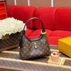 Louis Vuitton The Drop PM Handbag in Monogram Coated Canvas
